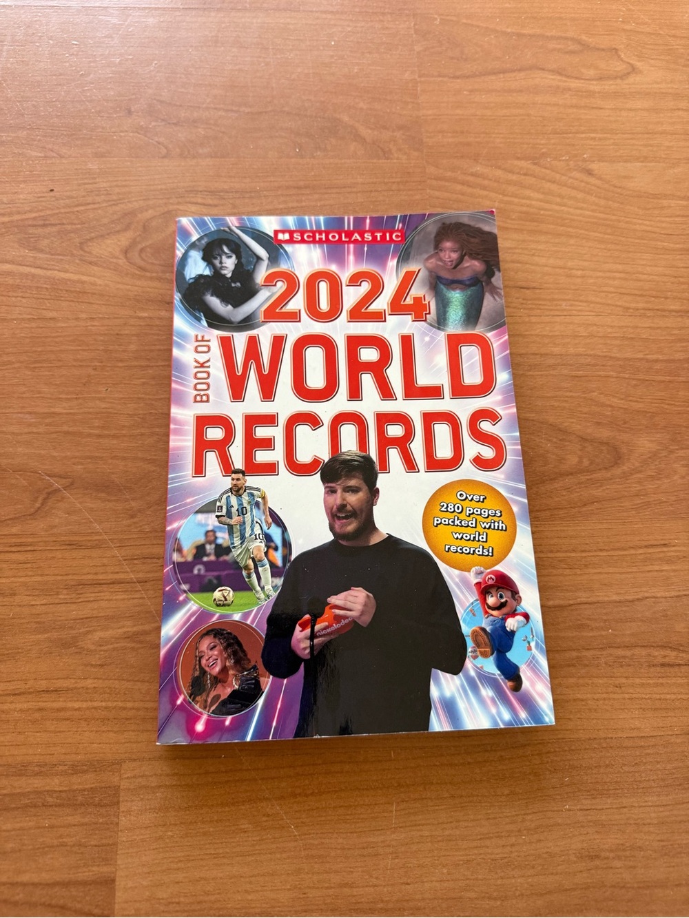 Scholastic 2024 World Records Book - Red and Purple Cover